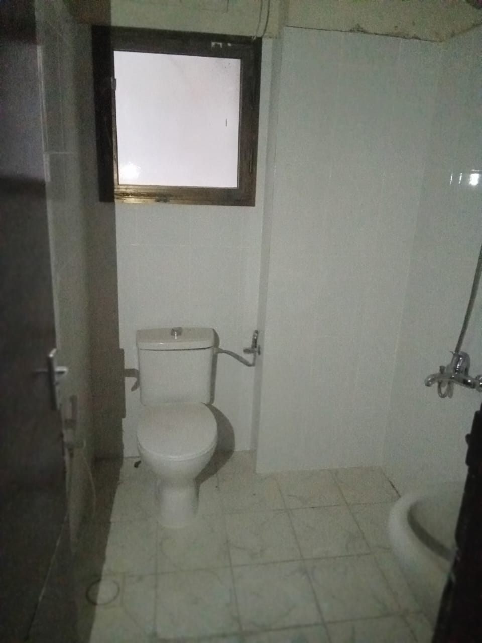 For Rent: Two-Bedroom Apartment with Living Room in Um Al Tarafa – Sharjah, Near Nesto and Bus Station