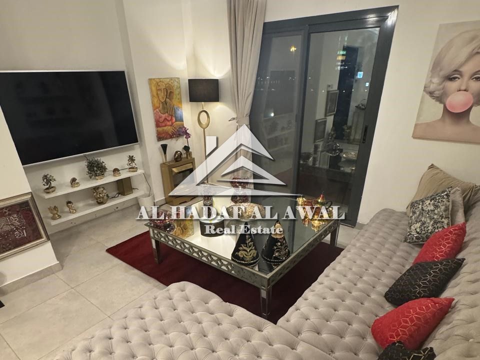 For monthly rent: One bedroom and living room apartment in Al Khan area (opposite Shabab Al Khan Cafeteria). The apartment is fully furnished and is i
