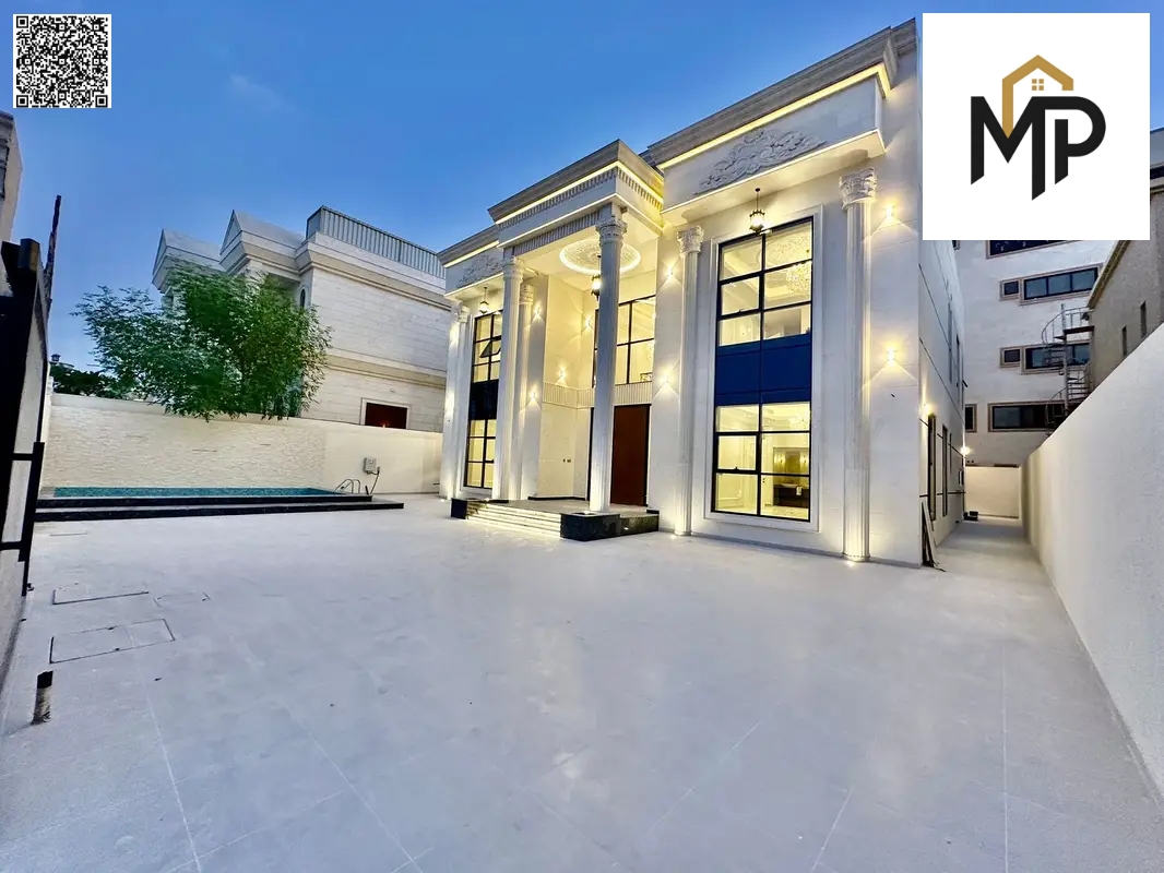 Own a villa in the prestigious Ajman Classic area with a swimming pool, at a price that includes registration and ownership fees, air conditioning, an