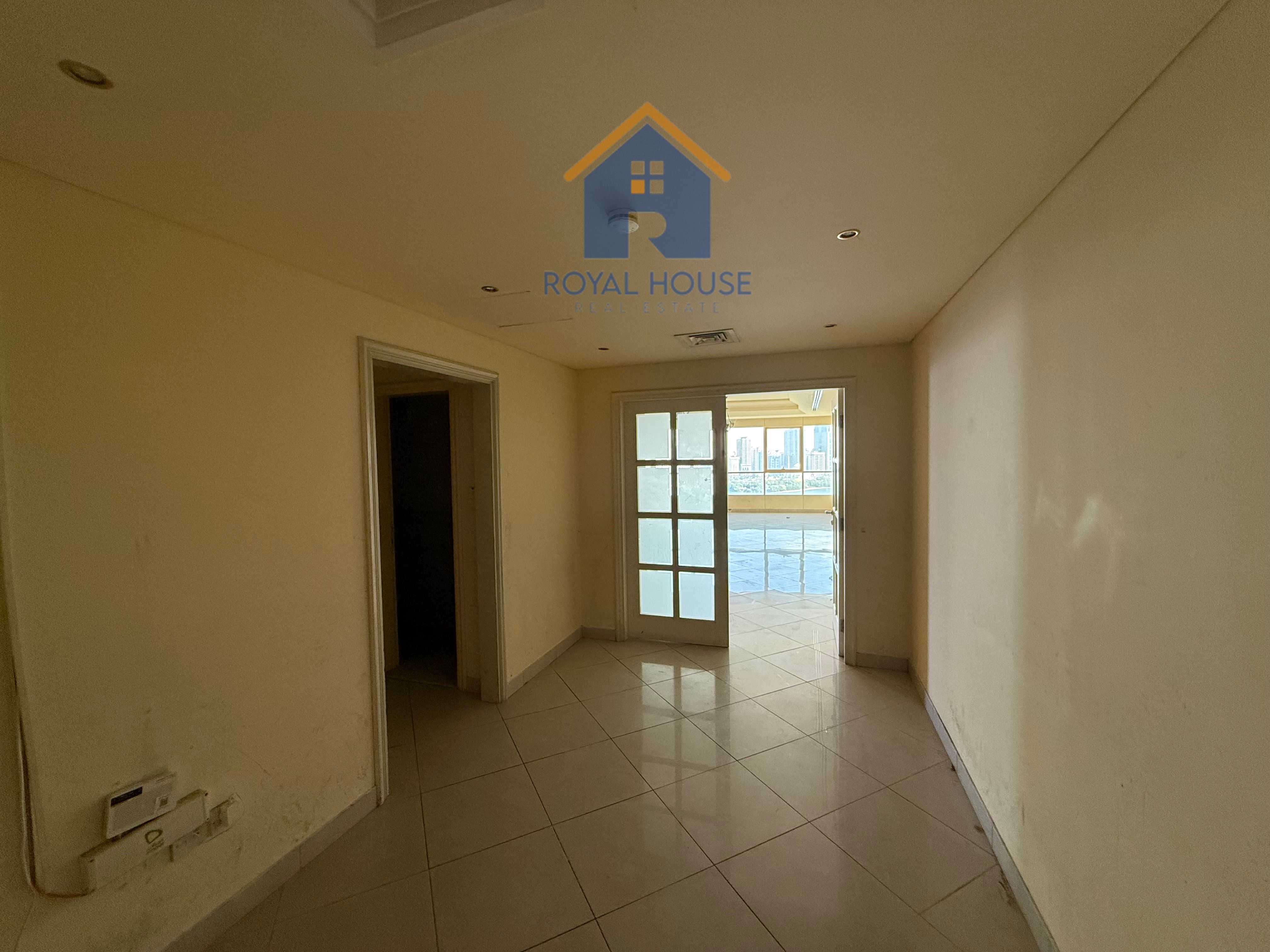 4 BR Haven in Al Majaz: Serene Water View & Security
