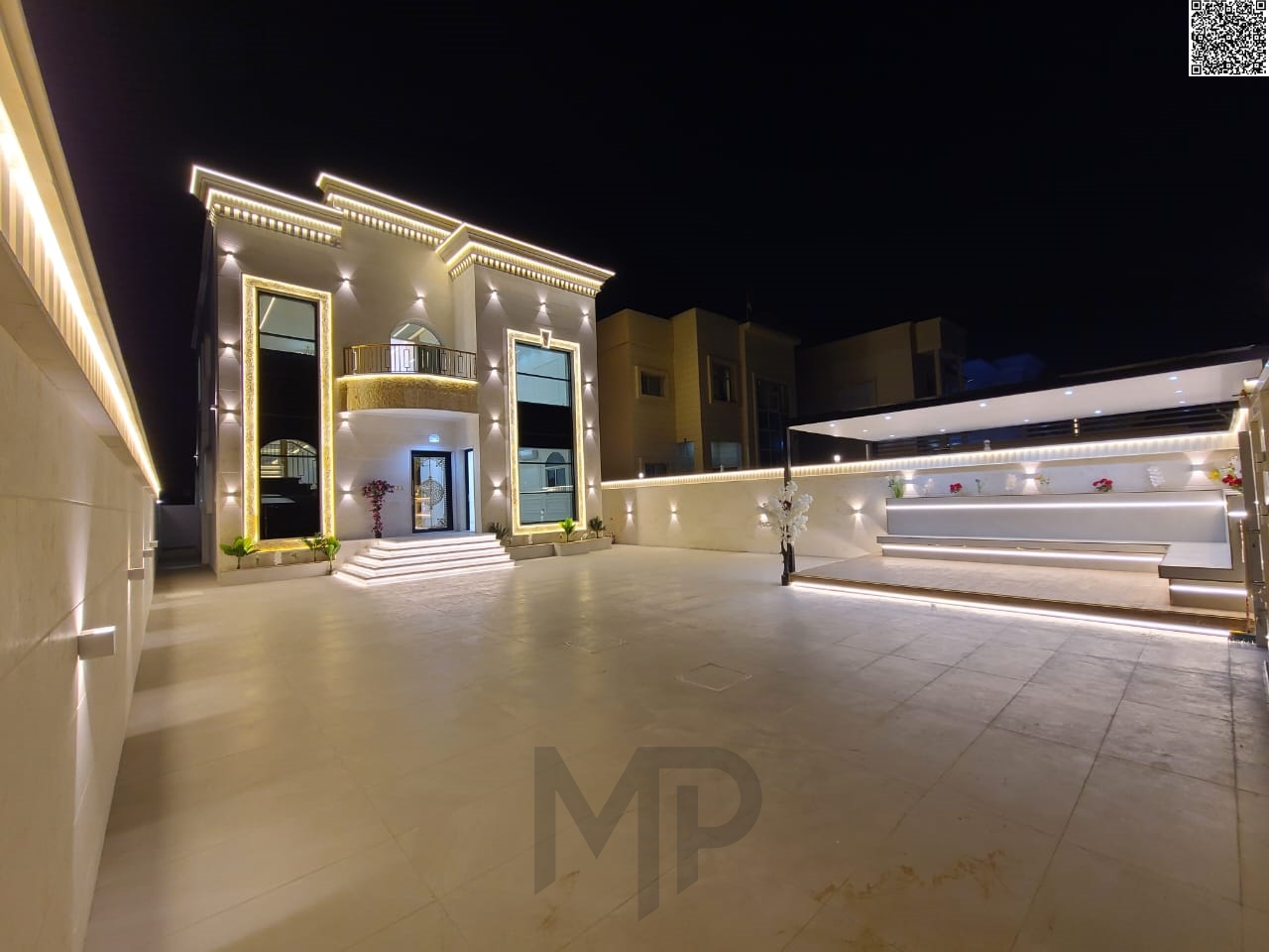 A luxurious villa with a modern design located in Al Muwaihat 1, featuring spacious areas and high-quality finishes, with an ideal location directly o