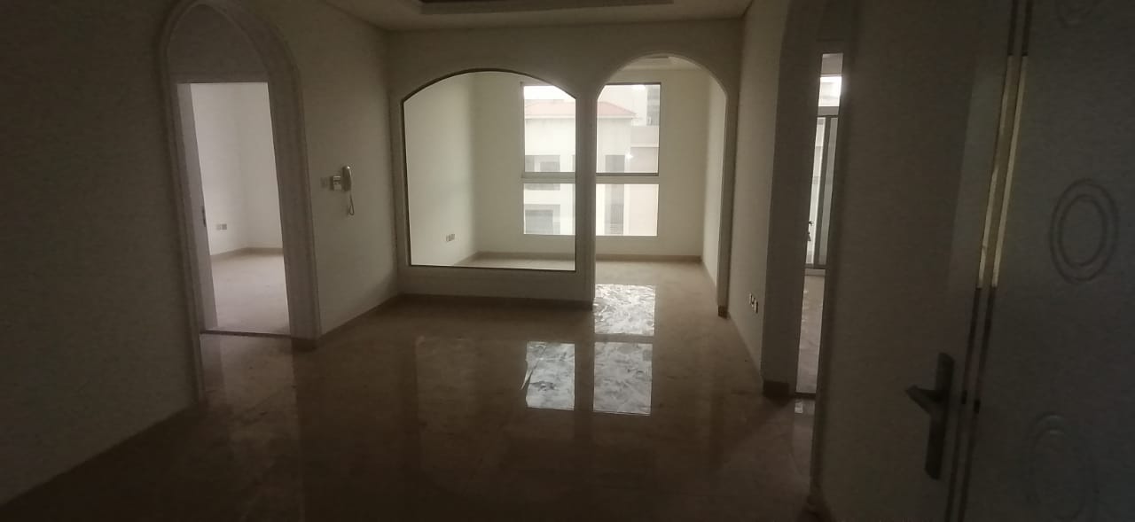 Now available for Annual rent in Ajman: a two-bedroom apartment with a living room, balcony, and two bathrooms. Strategically located and close to am