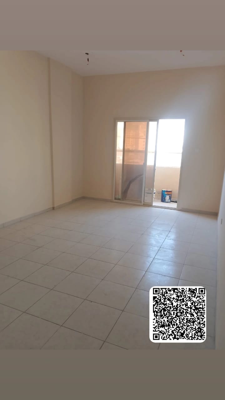 For annual rent: One bedroom and living room with a balcony, spacious area in Al Rashidiya, Ajman.