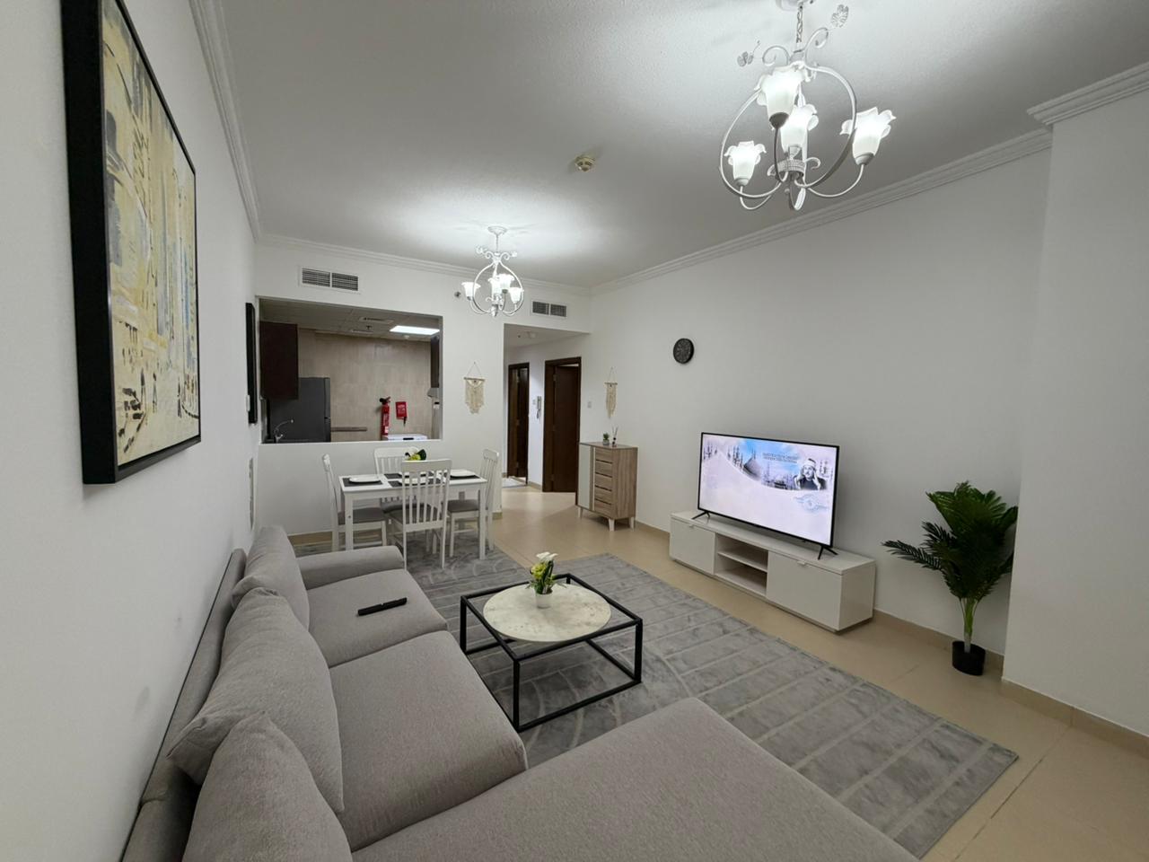 Furnished one-bedroom apartment for monthly rent in Ajman, first tenant, spacious, opposite City Centre, all utilities included.