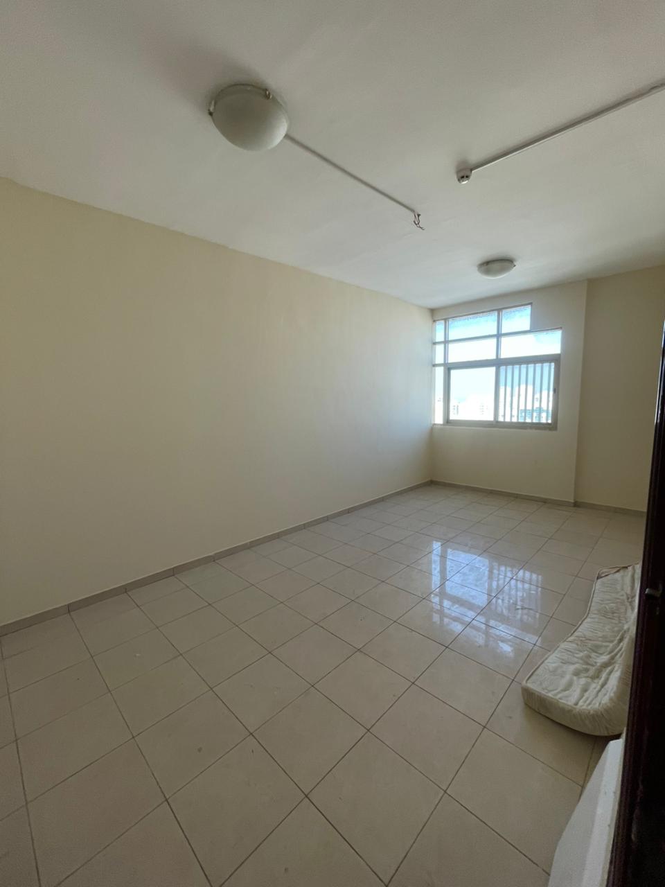 A stylish 1-bedroom apartment in Al Merija – Sharjah, offering a comfortable layout with a balcony, one bathroom, central AC, and a prime location clo