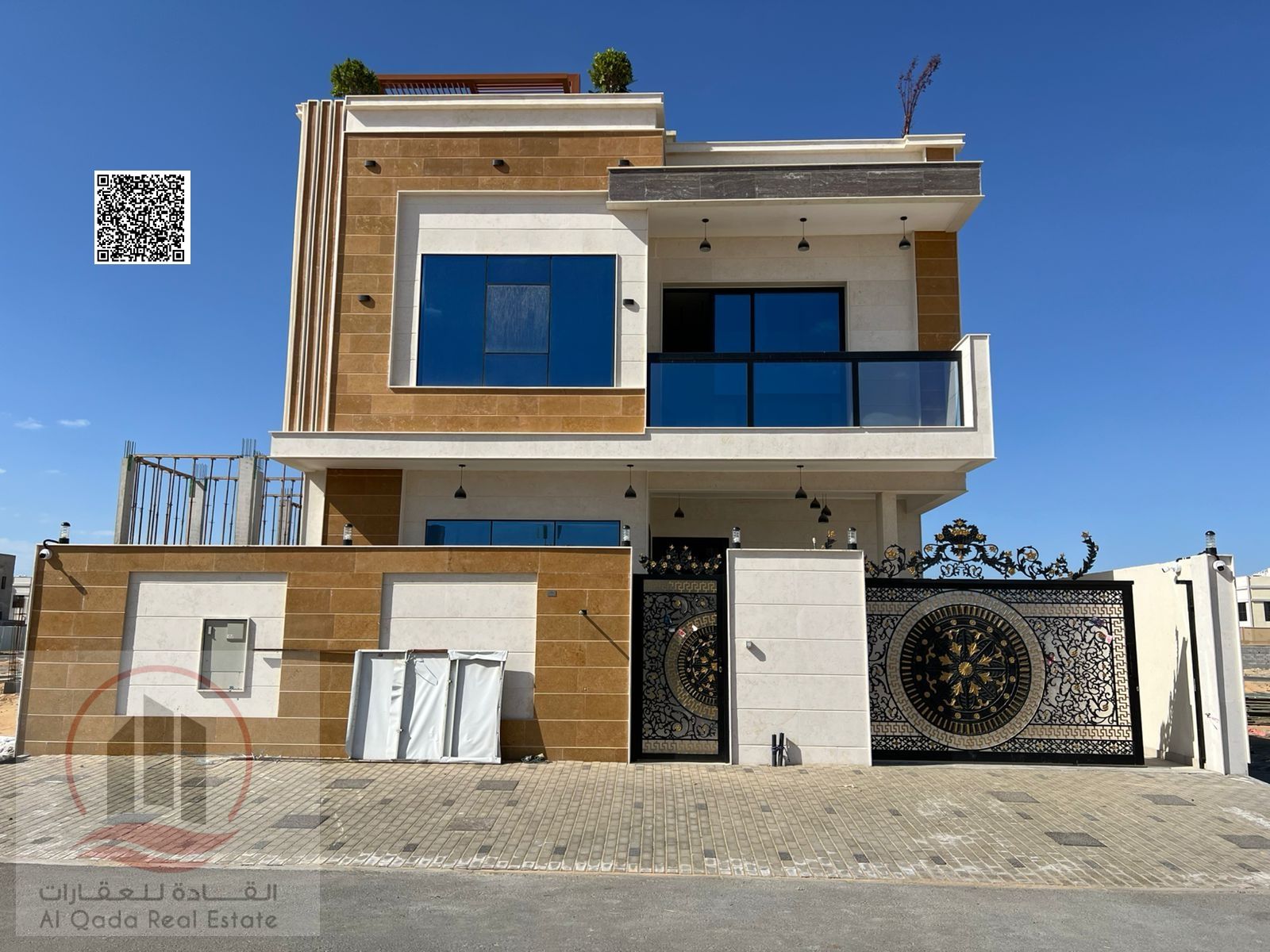 Villa for sale in Al Bahia, Ajman. Modern design. The villa includes registration fees and features 6 master bedrooms
