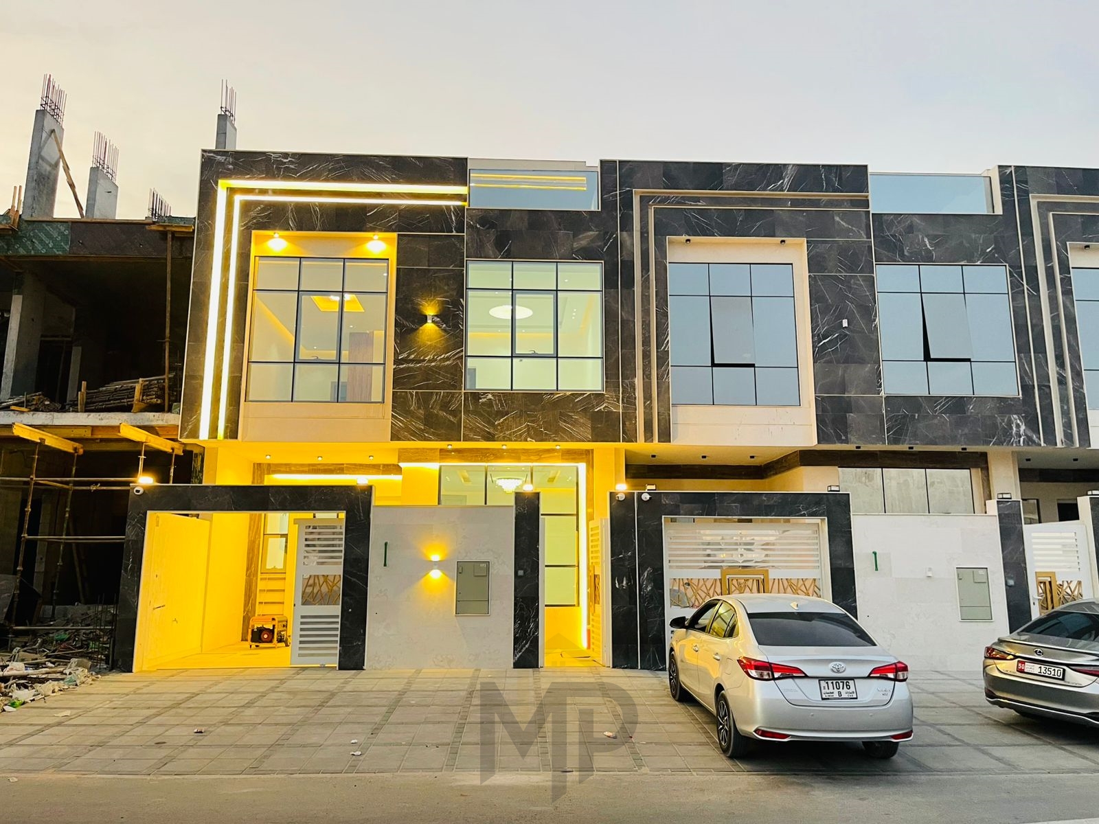 Luxury villa in Al Helio 2, Ajman, ready for immediate occupancy with high-end finishes. Freehold ownership for all nationalities.