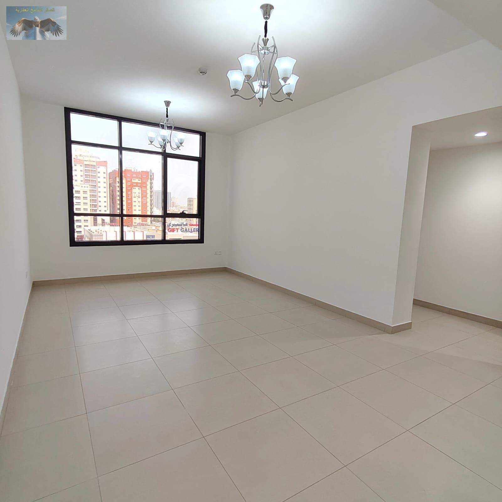 Two bedrooms and a hall with one month free and free parking, built-in wardrobes, spacious layout, super deluxe finishing, close to all services.