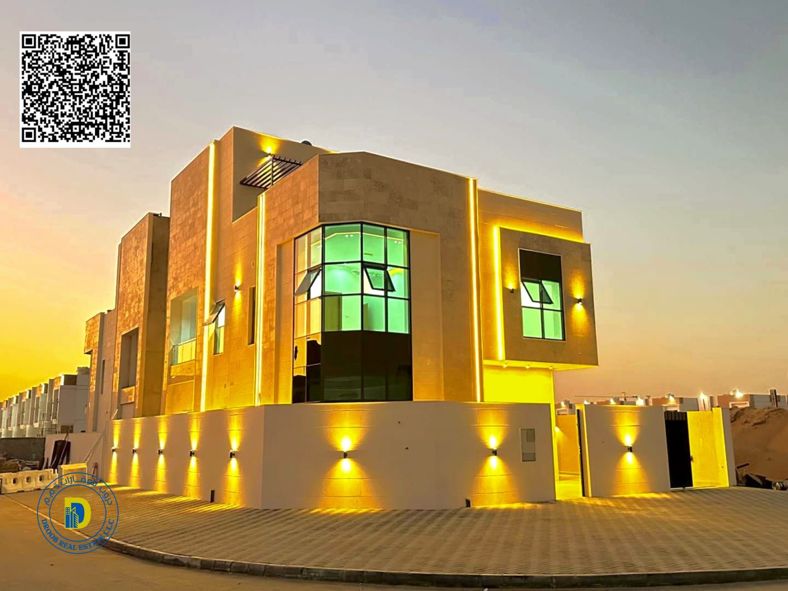 Modern corner villa with 6BR and a roof in Al-Helio 2 . Registration fees included. Super deluxe finishing. Freehold . Bank financing