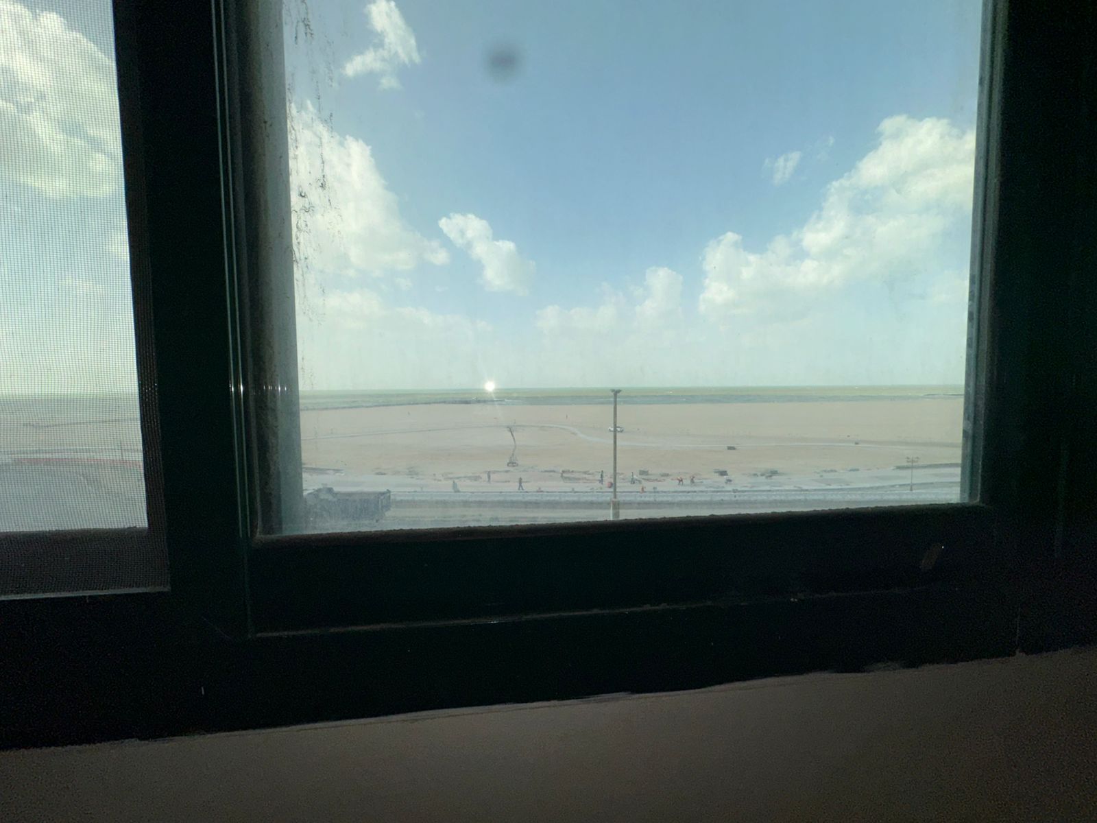 A very special one-bedroom apartment with a living room, located on the Ajman Corniche, directly on the sea.
