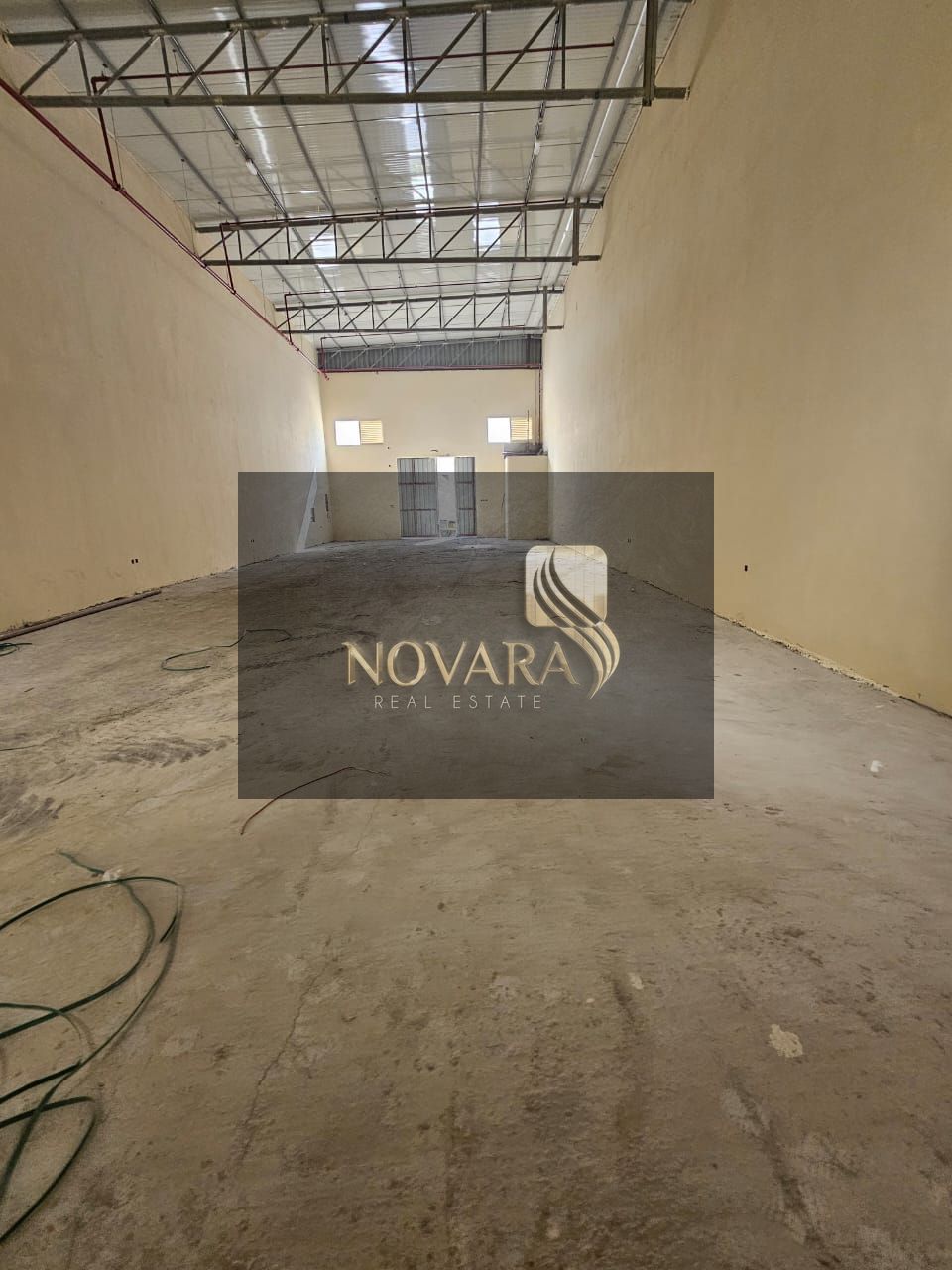 Available for rent in Umm Al Quwain: a 2500 sq ft warehouse with 38 kW electricity and a rent of 115,000, and a 1700 sq ft warehouse with a rent of 85