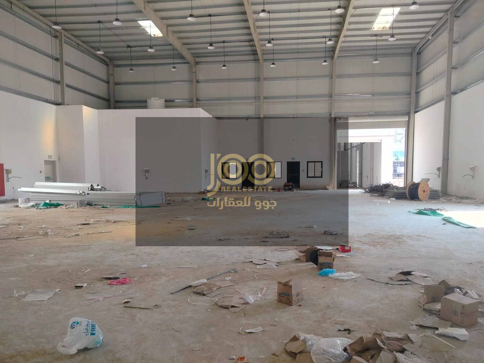 Warehouse for rent in Umm Al Thu'ub Industrial Area, Umm Al Quwain. It includes a mezzanine, providing additional space for storage or business operat