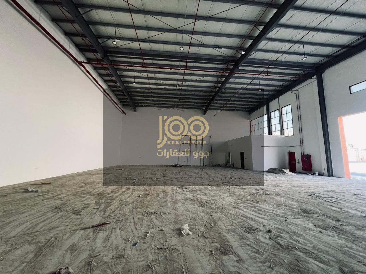 A spacious warehouse is available for rent in the Umm Al Thu'ub area, boasting a prime location suitable for various commercial or storage activities.