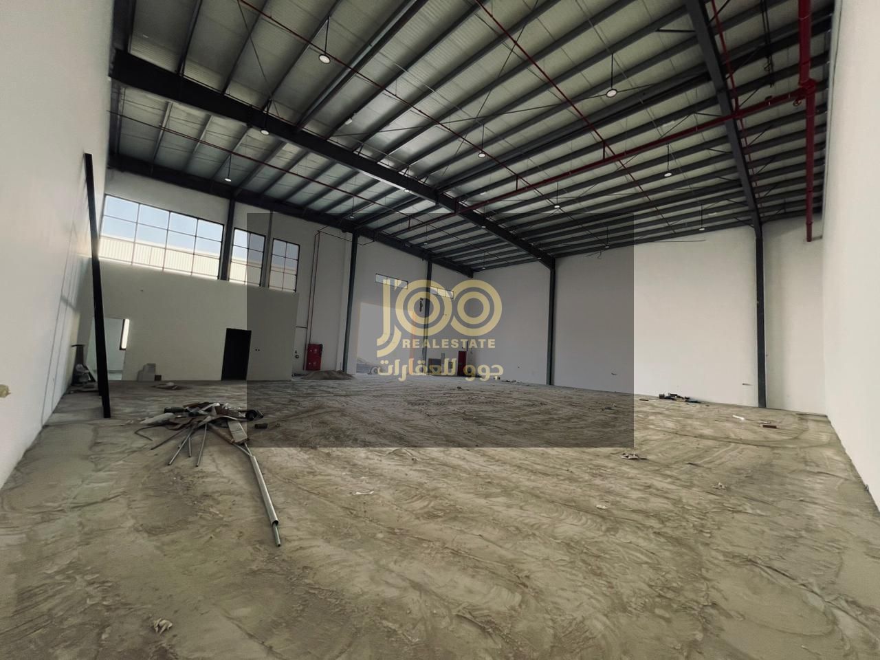 Warehouse for rent in Umm Al Thu'ub. Spacious and suitable for storing various goods. Strategically located near main roads.