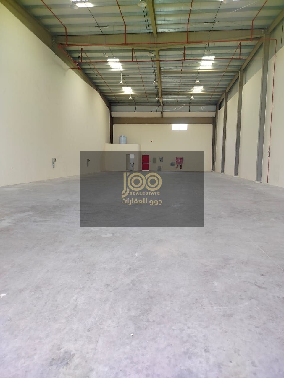 Warehouse for rent in Umm Al Thu'ub area, distinguished by its prime location, suitable for various commercial and industrial uses.