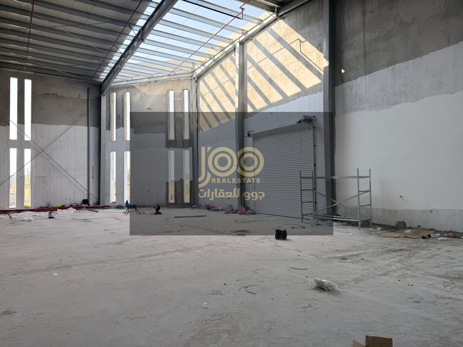 A large warehouse with an area of 13,000 square feet and 150 kilowatts of electricity.