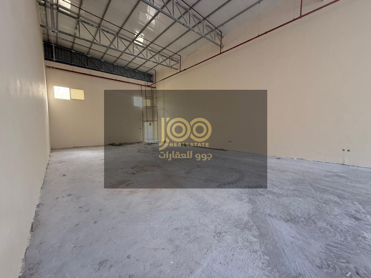 A prime warehouse for rent in Umm Al Quwain, Umm Al Thu'ub area, easily accessible and suitable for commercial and industrial activities.