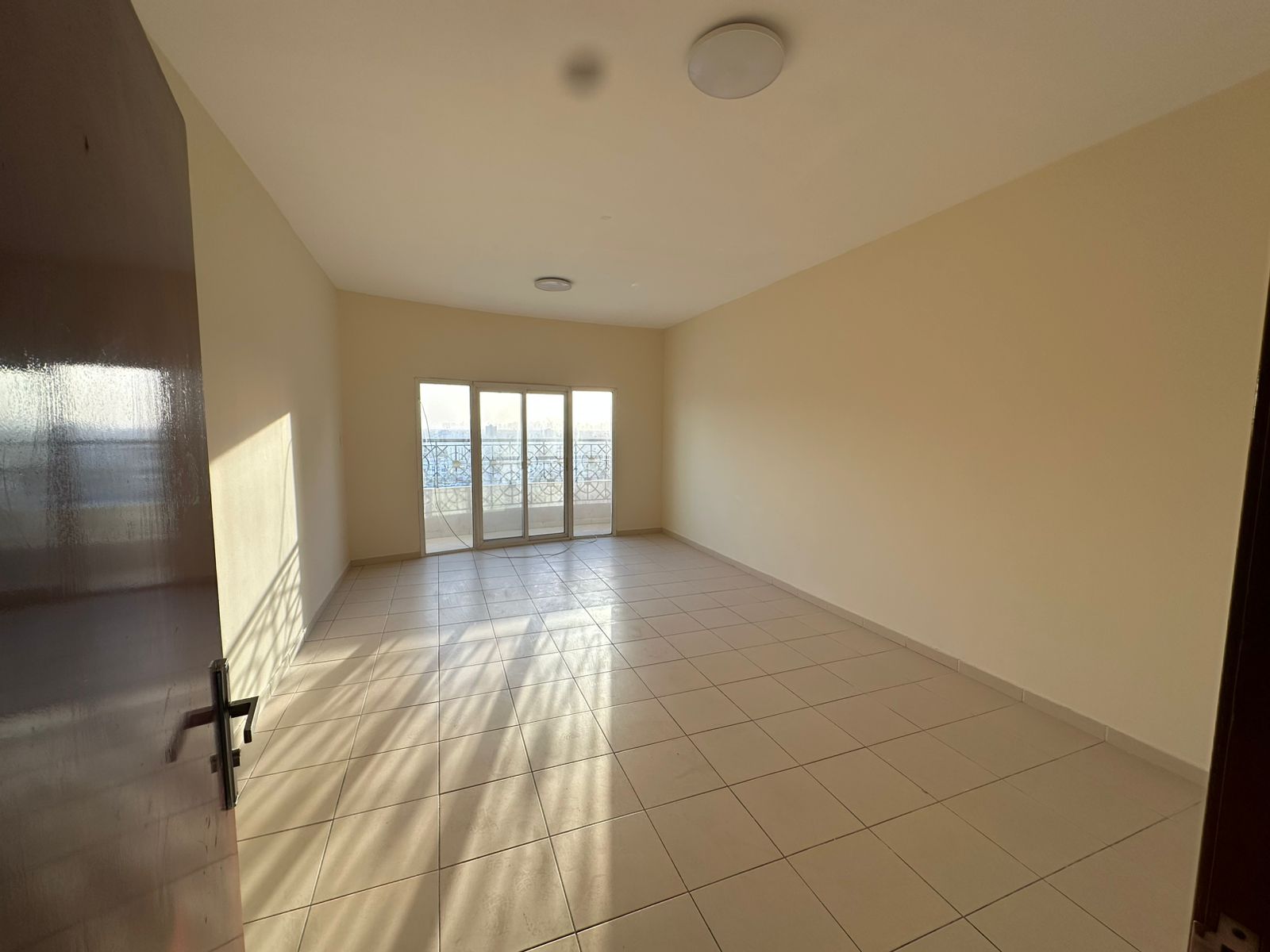Two rooms and a hall in Al Nuaimiya 1, near Al Hikma School and near Al Ittihad Street.