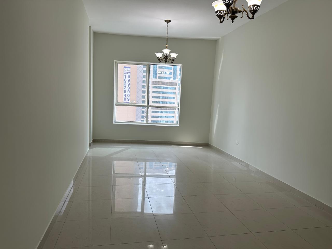 Three-bedroom apartment with living room in Al Khan Al Qasba, spacious layout, first tenant after maintenance, free AC, 4 bathrooms, maid room, panora