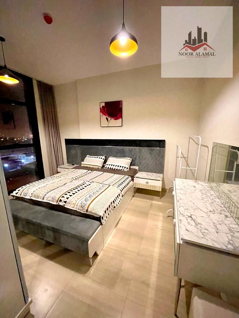 Sharjah, Al Taawun area, brand new building, first occupancy, hotel-style furnishings, two bedrooms, living room, kitchen, two bathrooms