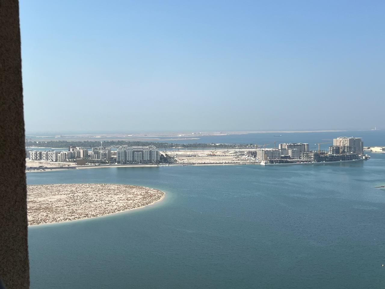 One-bedroom apartment with two balconies in Al Khan Al Qasba, first tenant after maintenance, free AC, sea view, full amenities, rent 51,000 AED, clos