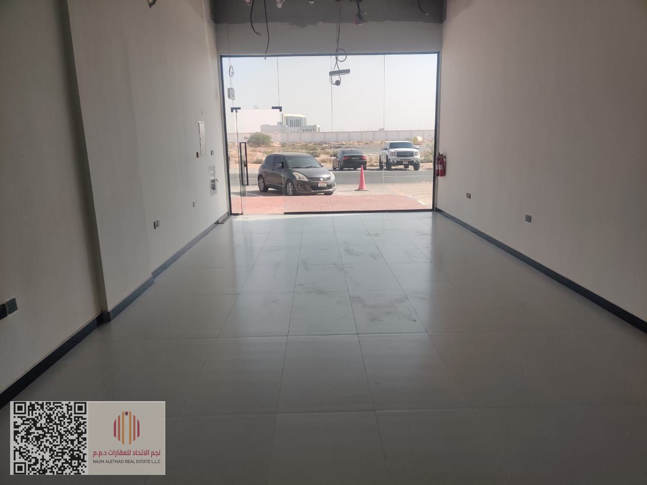 A distinguished commercial shop available for annual rent, located in Ajman Emirate – Al Jurf 3 area. It enjoys an excellent strategic corner location