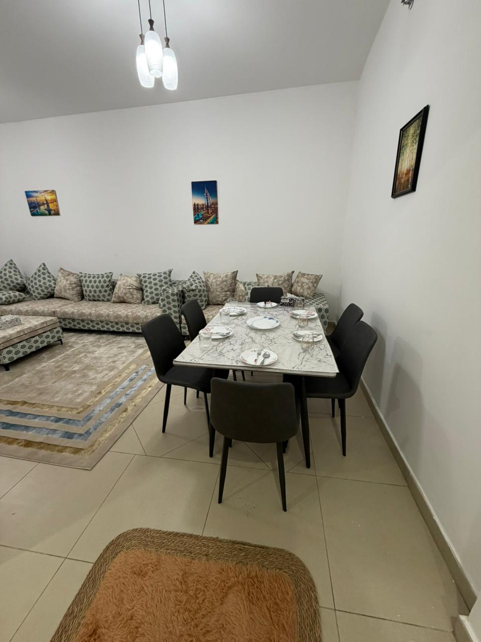 Furnished 2-bedroom apartment for monthly rent in Al Shorouq Towers Ajman, spacious, prime location, all utilities included.