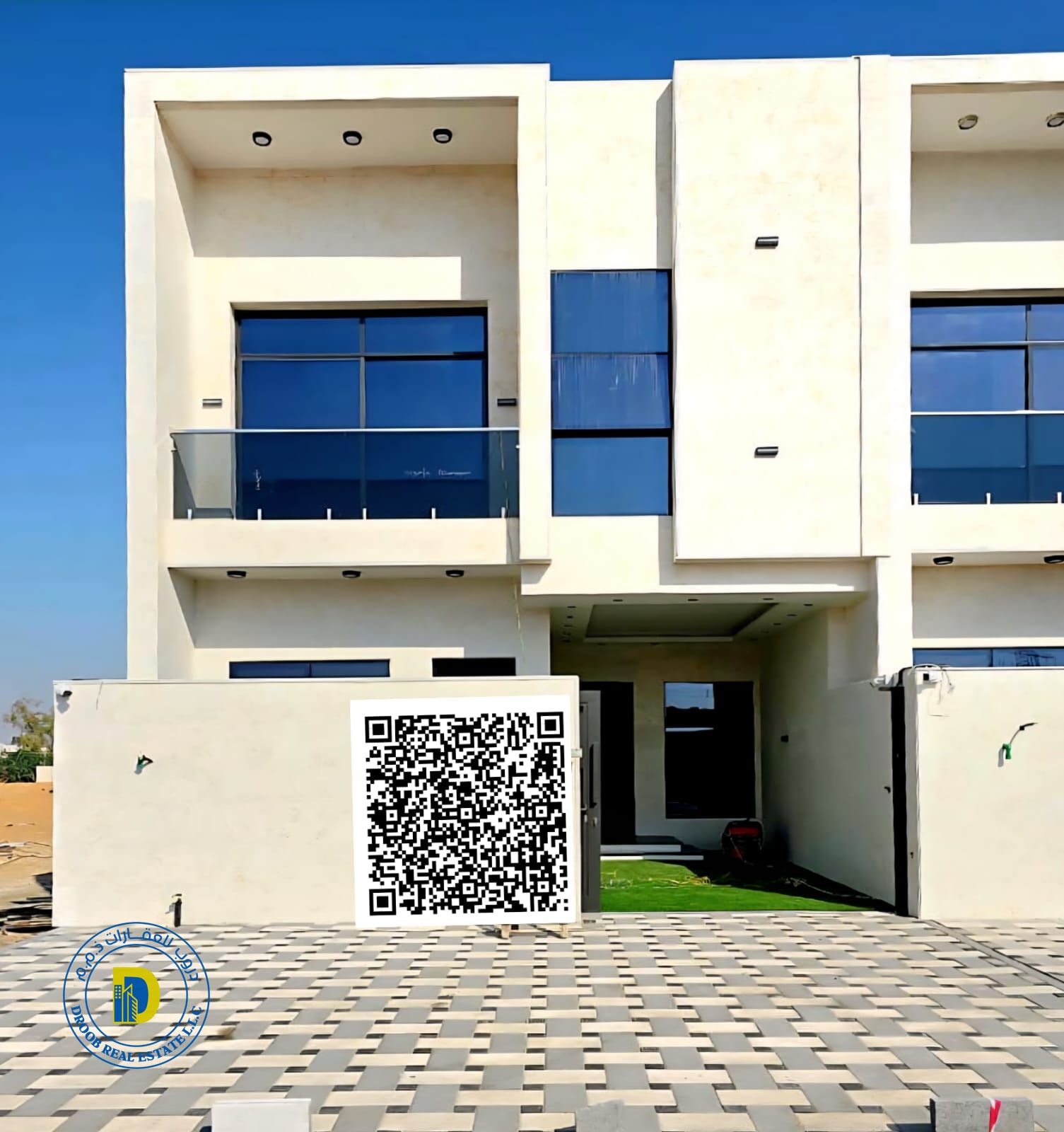 For sale: Modern 4-bedroom townhouse in Al Helio area, Ajman. Price includes registration fees.