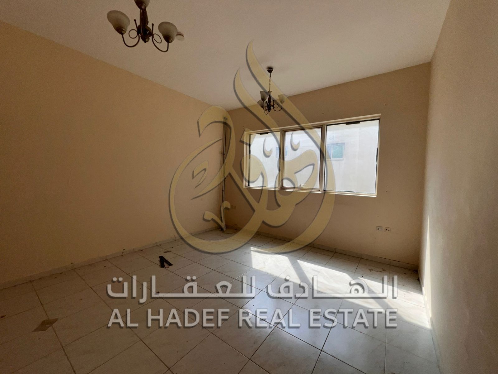 For rent in Sharjah, in the heart of Al Taawun. Available: 2 bedrooms, a living room, a dressing room, a laundry room, and a balcony. Payment: 4-6 ins