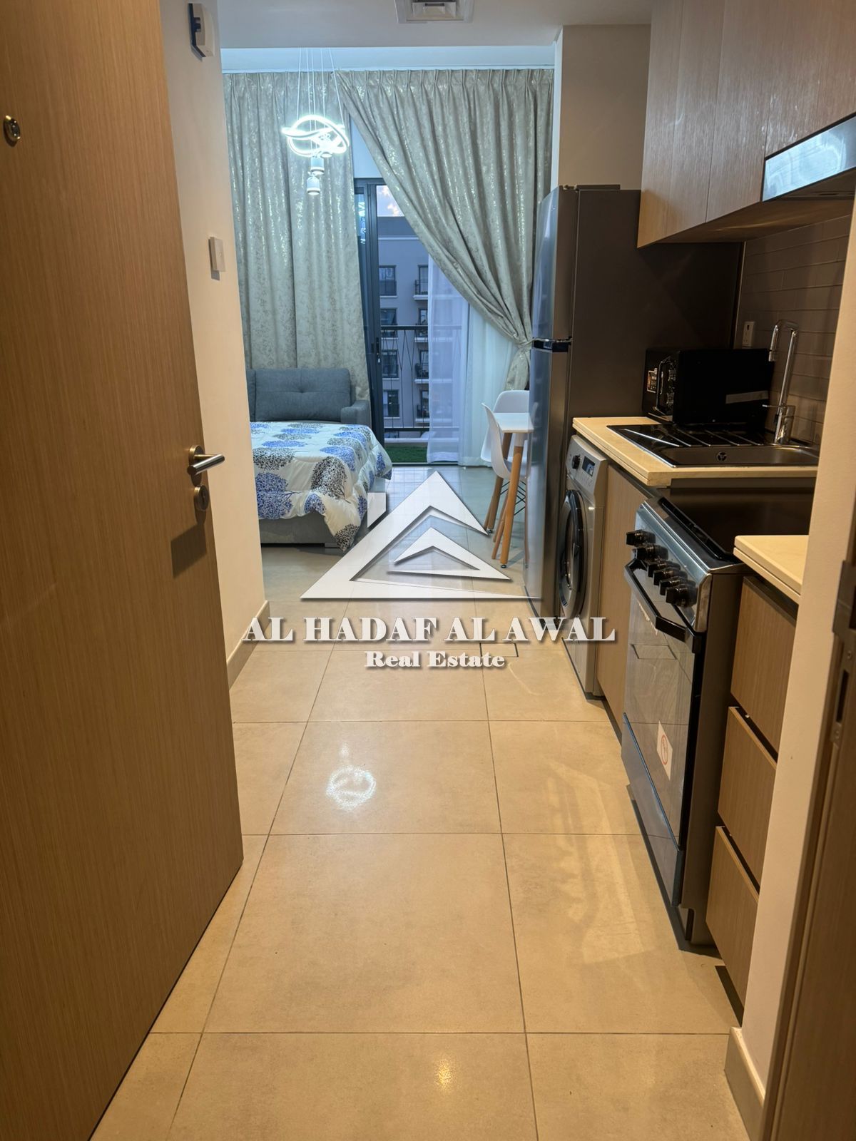 A spacious studio apartment with a balcony is available in Maryam Island, overlooking the pool. The price is 7500, including all services.