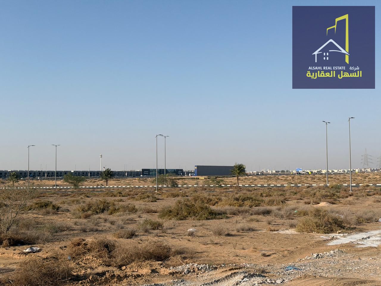Land for sale in Telal City, residential/commercial, in an excellent location near Emirates Road.