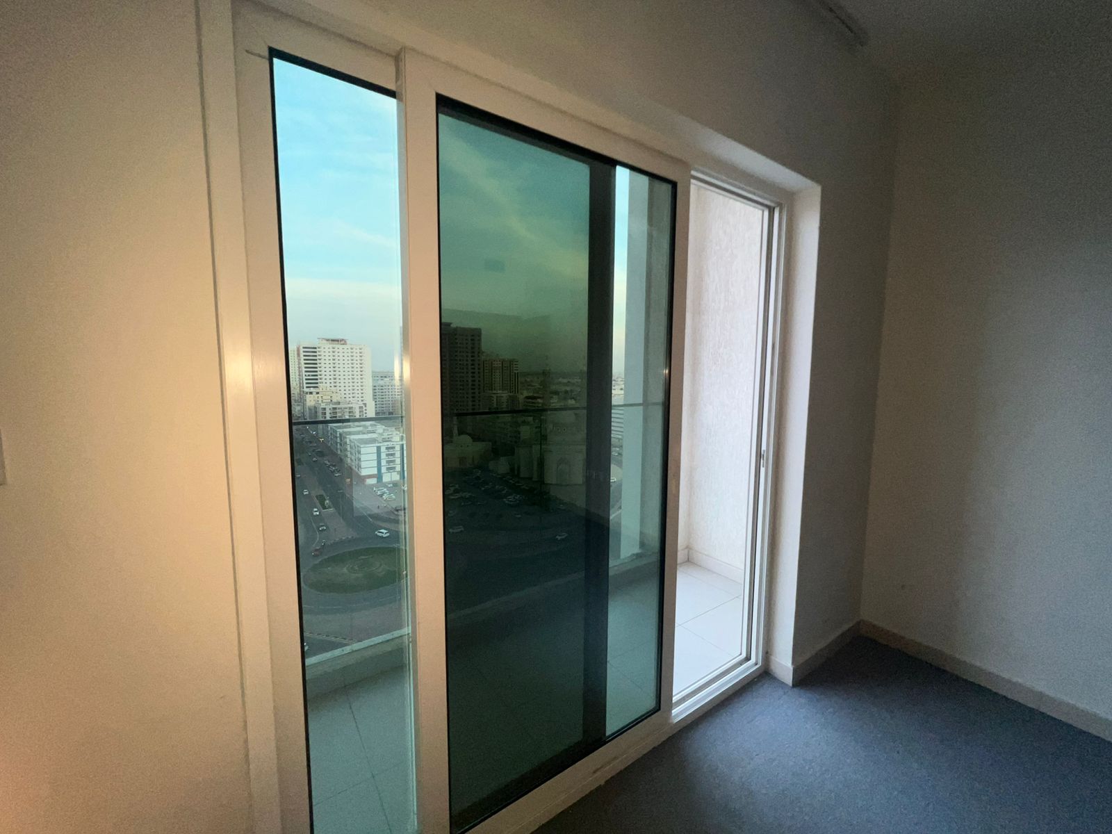 Panoramic two master-bedroom apartment with living room in Al Taawun, first tenant after maintenance, balcony, parking, 3 bathrooms, storage room,