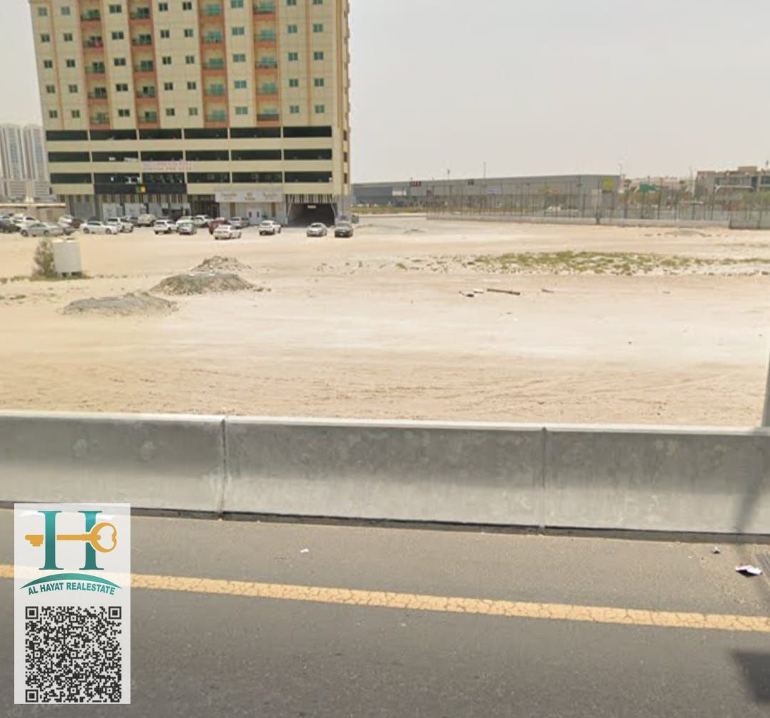 Two residential and commercial plots of land directly on Al Ittihad Street in Al Jurf 2, Ajman Central, freehold for all nationalities