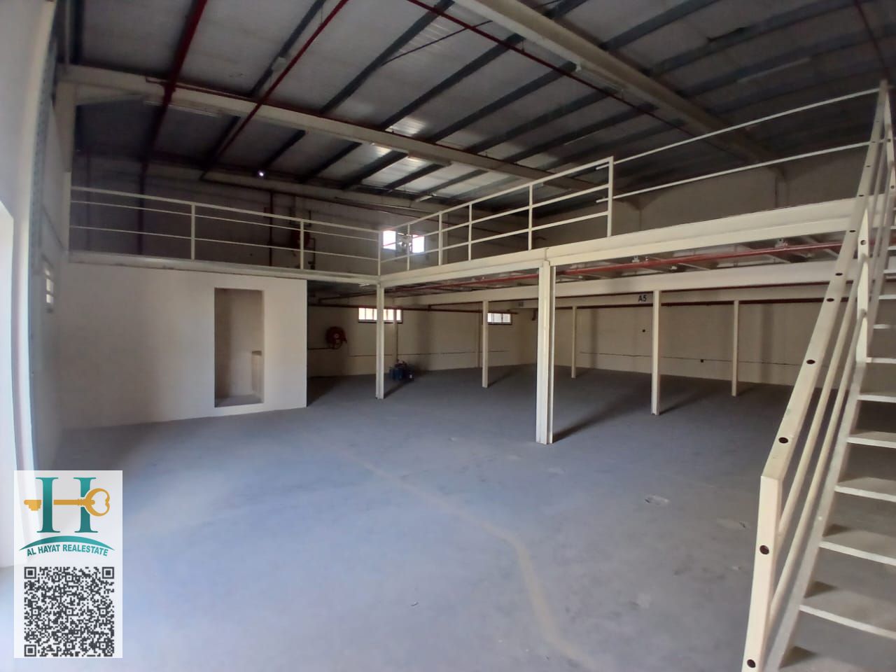 Warehouse with mezzanine for rent in Ajman Industrial 1