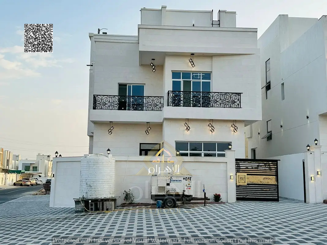 Luxury corner villa in Al Helio 2, Ajman, ready for immediate occupancy with high-end finishes and spacious living areas. Freehold ownership for all n