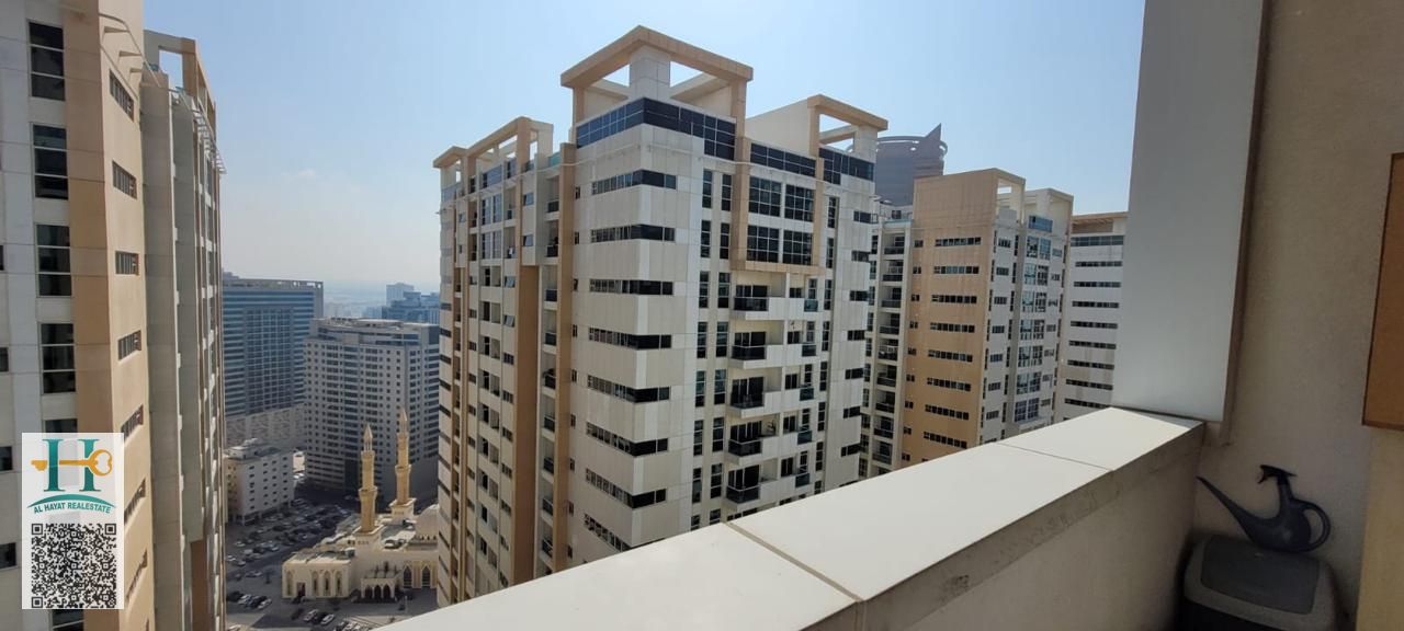 In city tower Ajman 2 bedroom with balcony open kitchen and payment plan