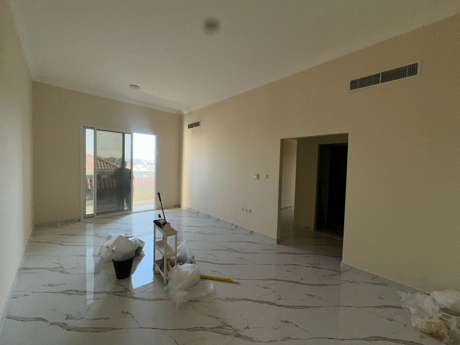Two-bedroom apartment with a living room, 3 bathrooms in Al Muweihyat 2, very large space, second floor, excellent location, close to the Dubai exit.