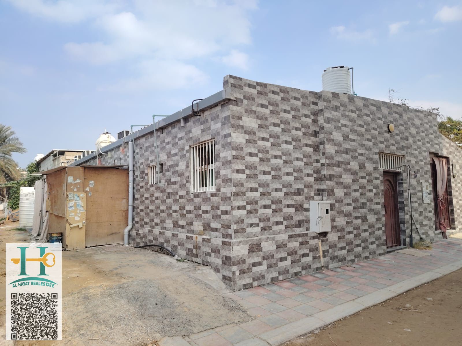 For sale: an Arabic house in Al Rashidiya 3, suitable for residential and investment purposes. It is located on a corner plot with a main street and two alleys, offering privacy and easy access.