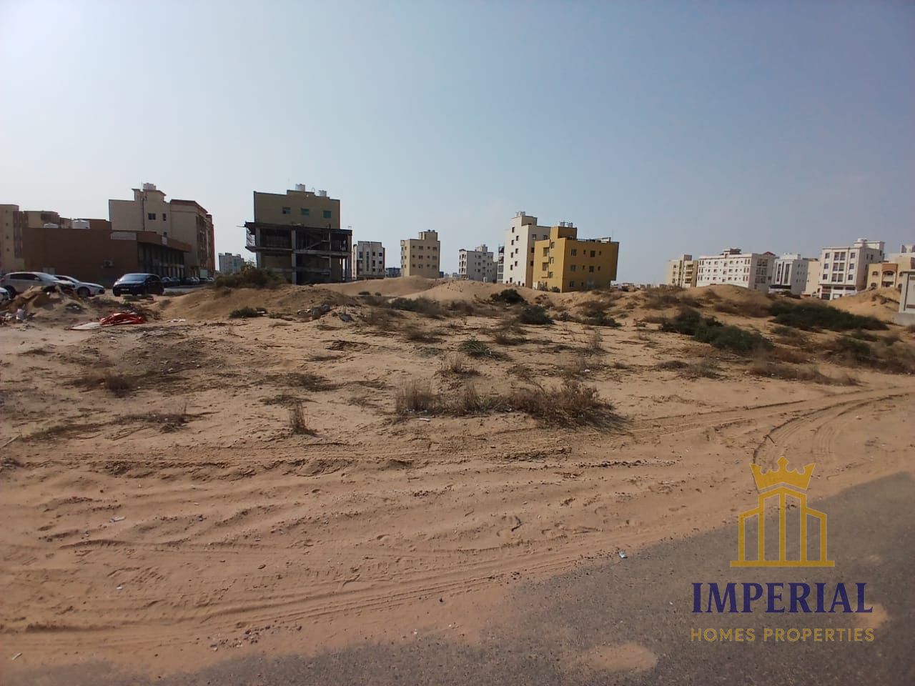 Residential/commercial land (G+3) in Al Alia, Ajman, with a prime location and excellent price. Freehold ownership for all.