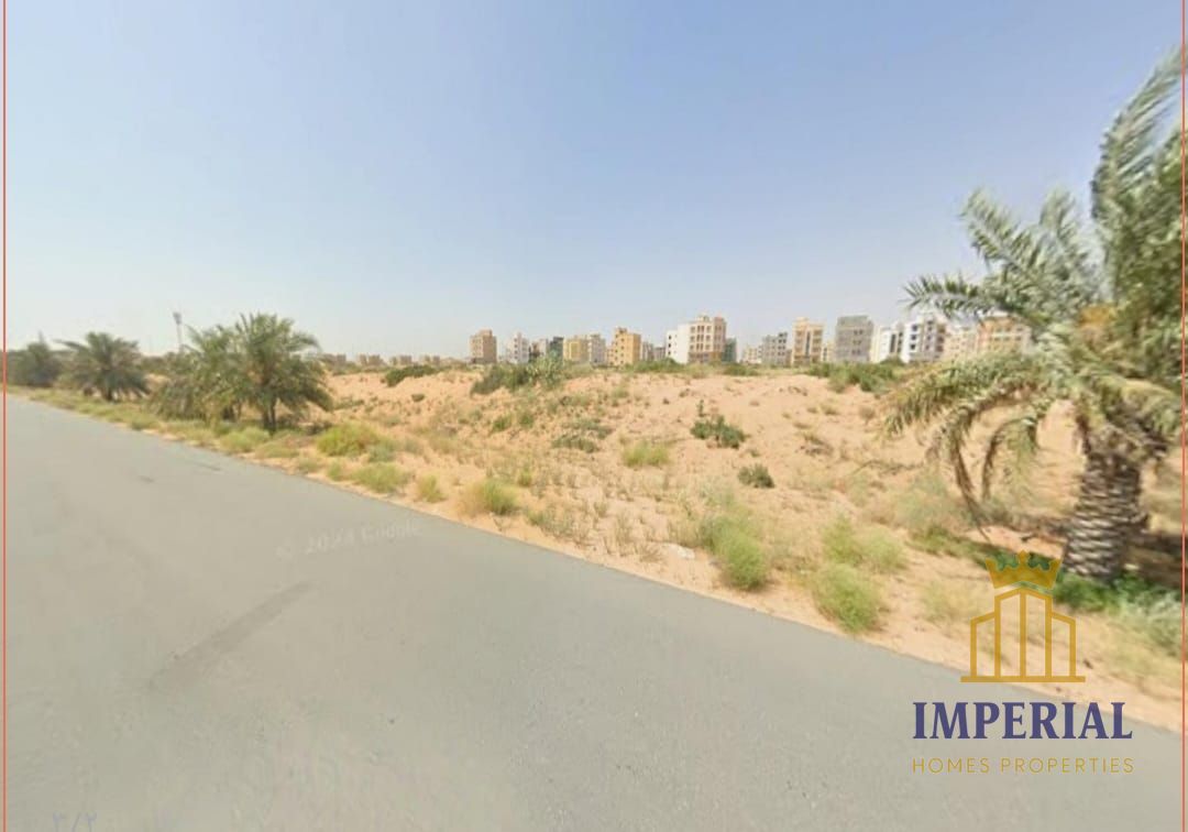 Residential/commercial land in Al-Aliya, corner plot on two streets (G+23), freehold ownership for all.