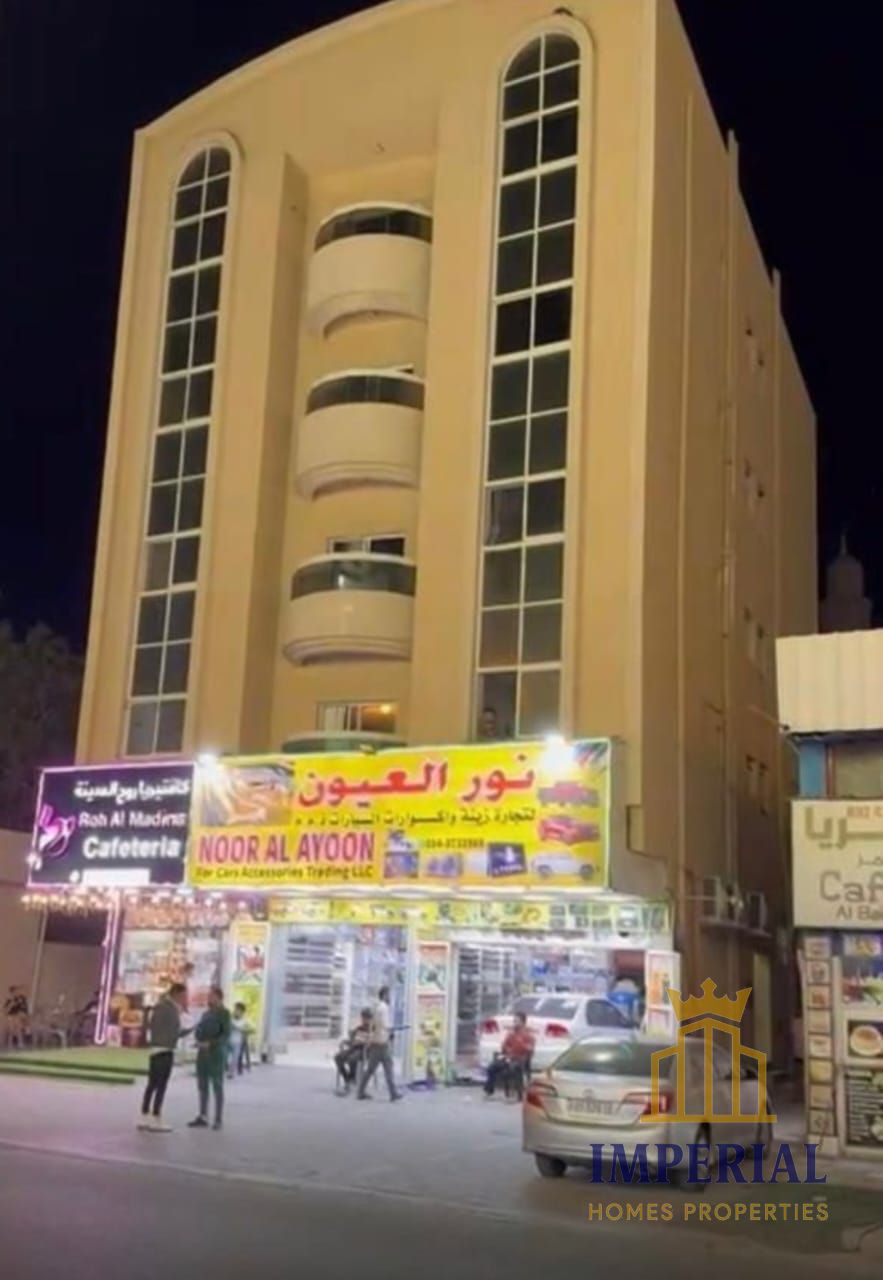 Residential and commercial building in Al Nakheel, Ajman (G+4), 8 years old, freehold ownership for all.