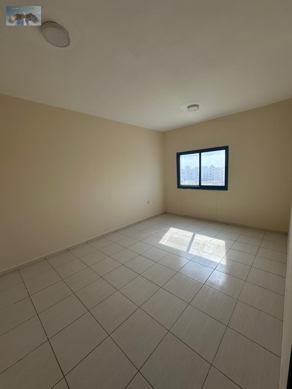 A golden opportunity for annual rent in Al-Na'imah: a large two-bedroom apartment with a living room, excellent size, and a prime location.