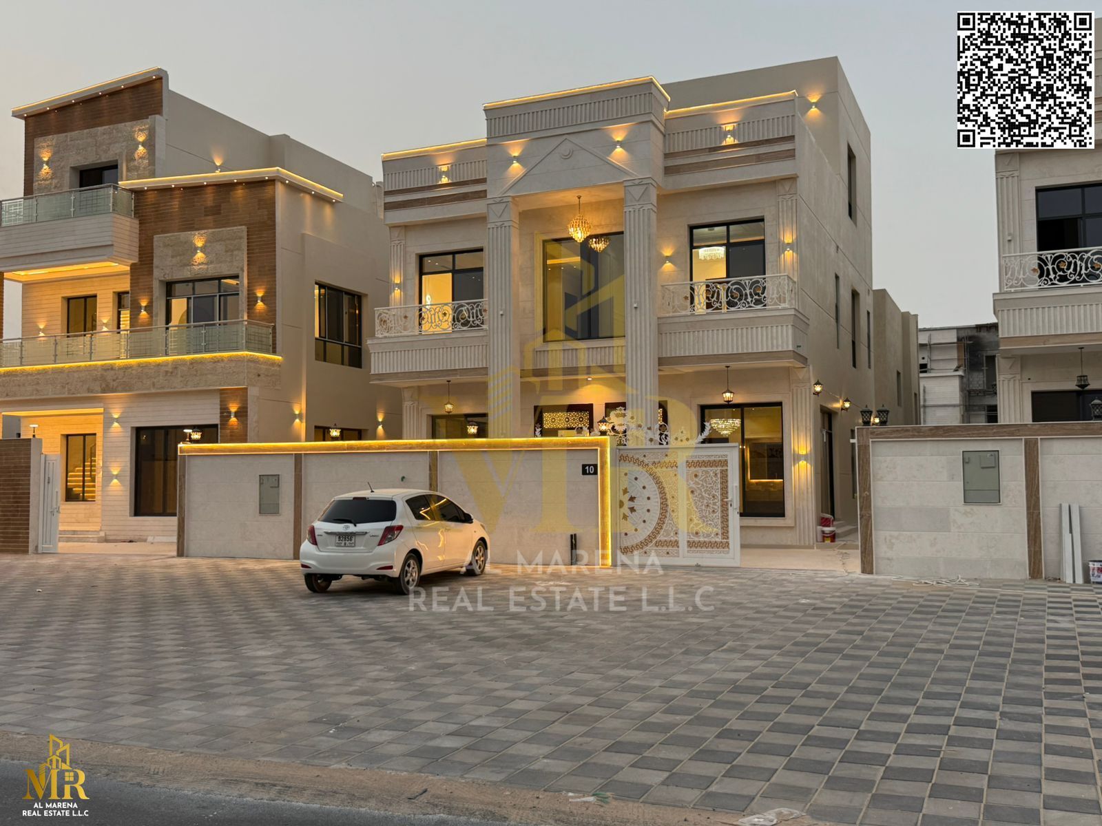 Near Emirates Transit Road, classic villa with 2 floors + roof, 5 master bedrooms, price includes registration & ownership fees, strategic location!