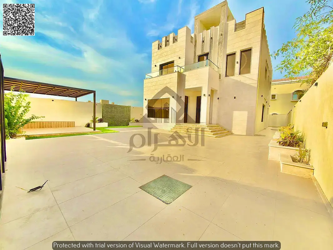 For sale: A luxurious villa in Al Muwaihat 1 consisting of 5 master bedrooms, a majlis, a living room with a kitchen, and a maid's room.