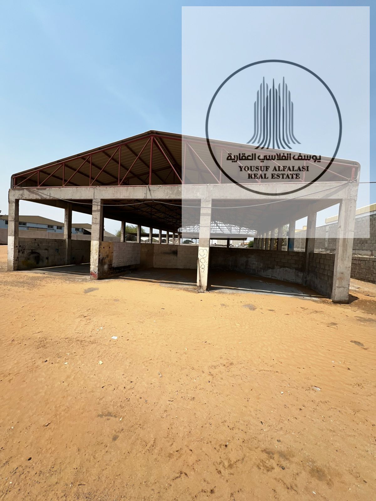 A 45,000 sq fenced plot of land with a canopy and office Price 670,000