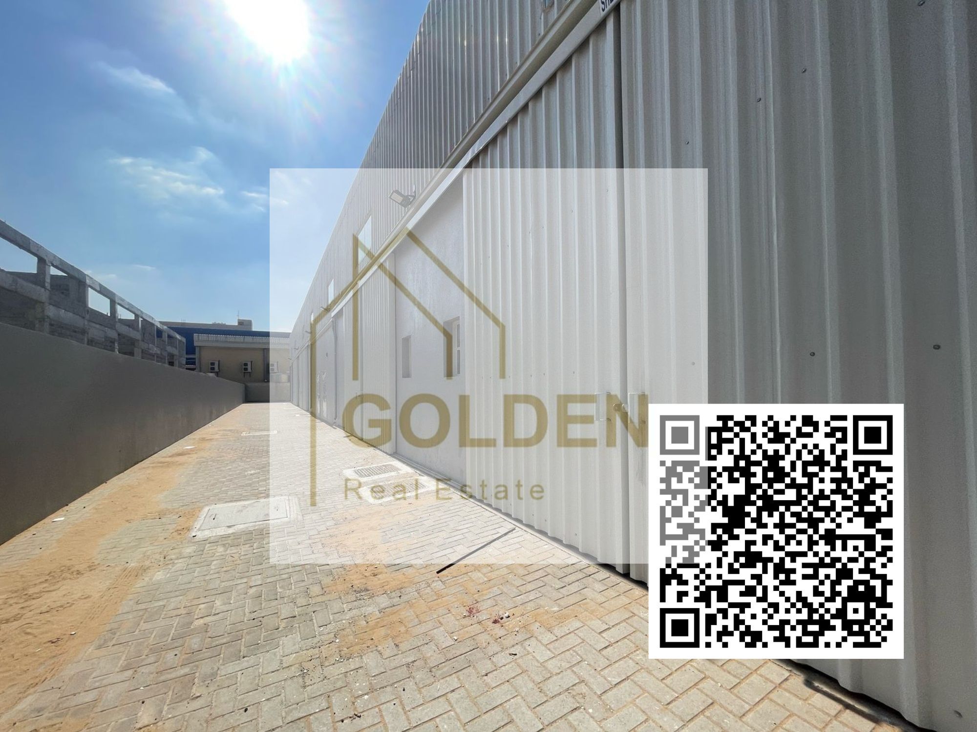Road-facing warehouse on a prime 2-road corner location, offering easy loading and offloading access in Umm Al Quwain.