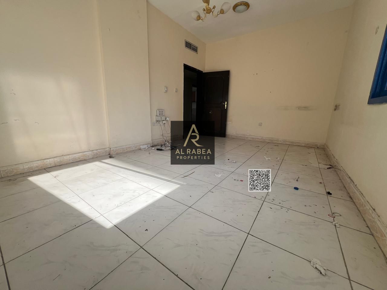 Al Nuaimiya 1, a two-bedroom apartment with a living room, balcony, and two bathrooms (as long as they are open). Price: 34,000 (payable in 4 or 6 ins