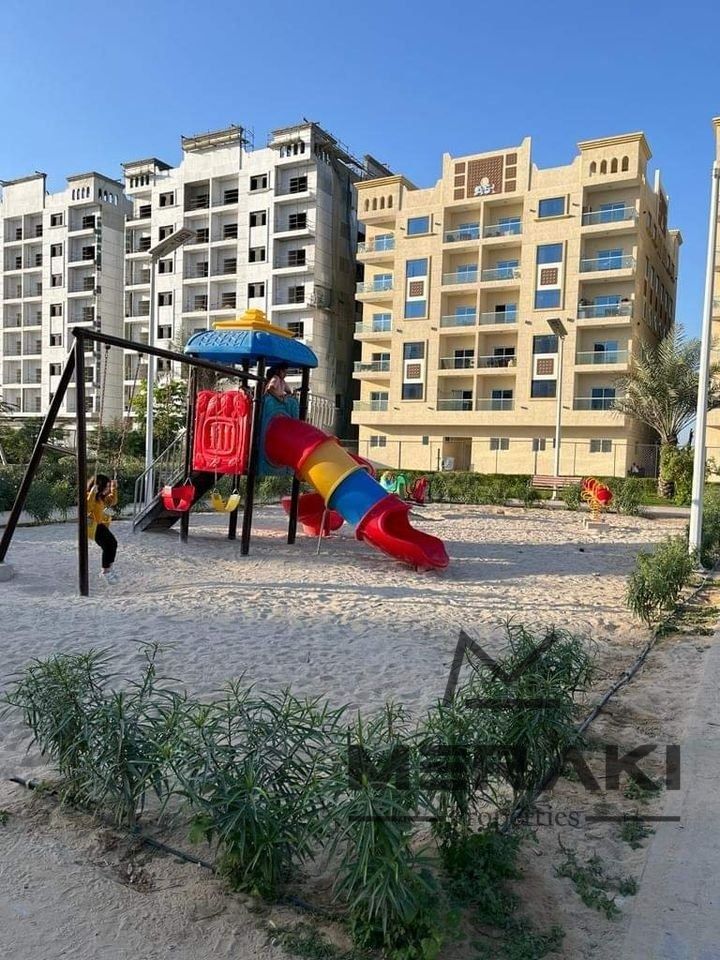 Own a Spacious 1-Bedroom Apartment in Al Ameera Complex with Easy Payment Plan