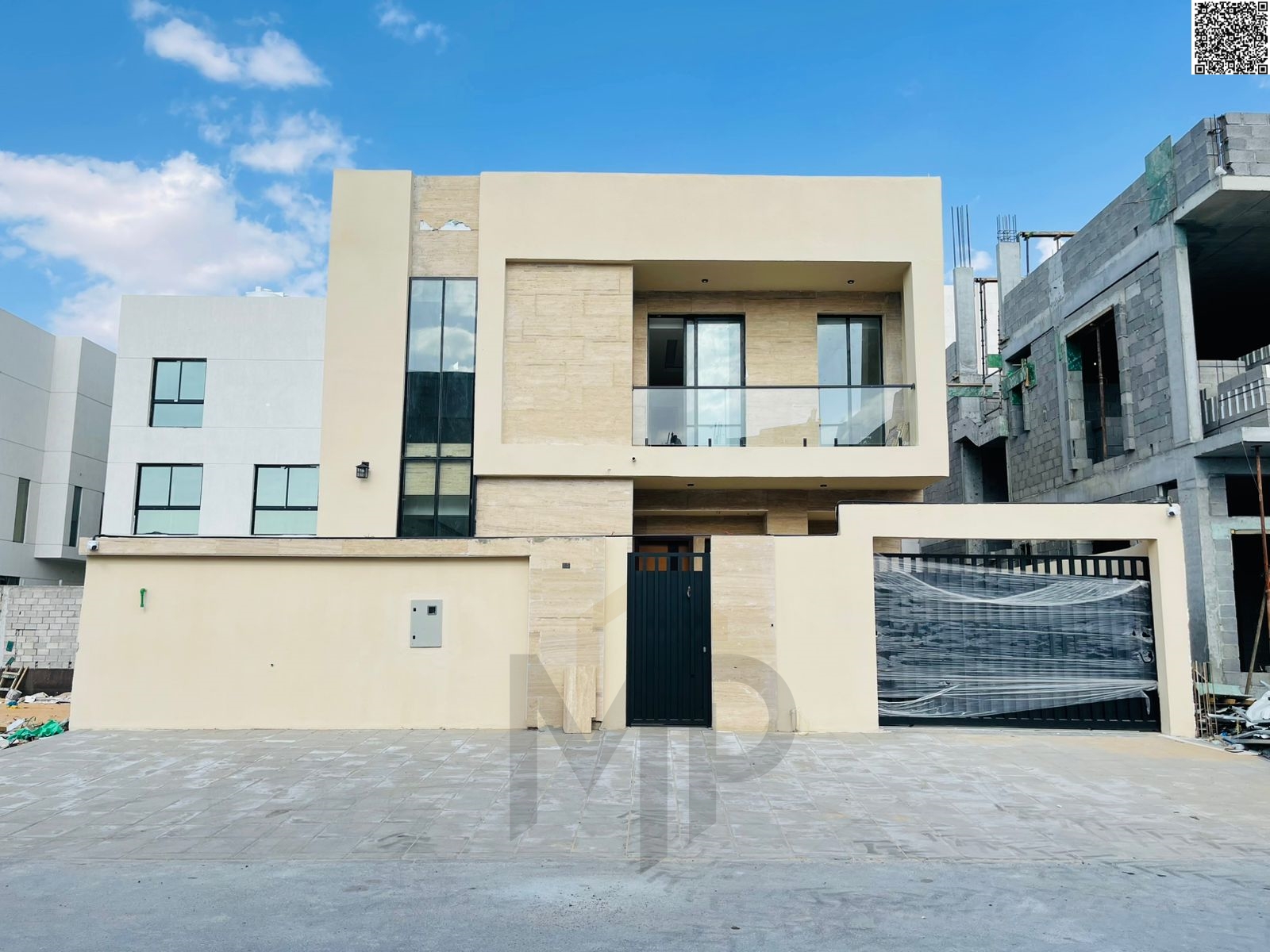 Luxury villa in Al Yasmin, Ajman, directly behind the mosque, with two floors and a roof, ready for immediate occupancy with high-end finishes, price