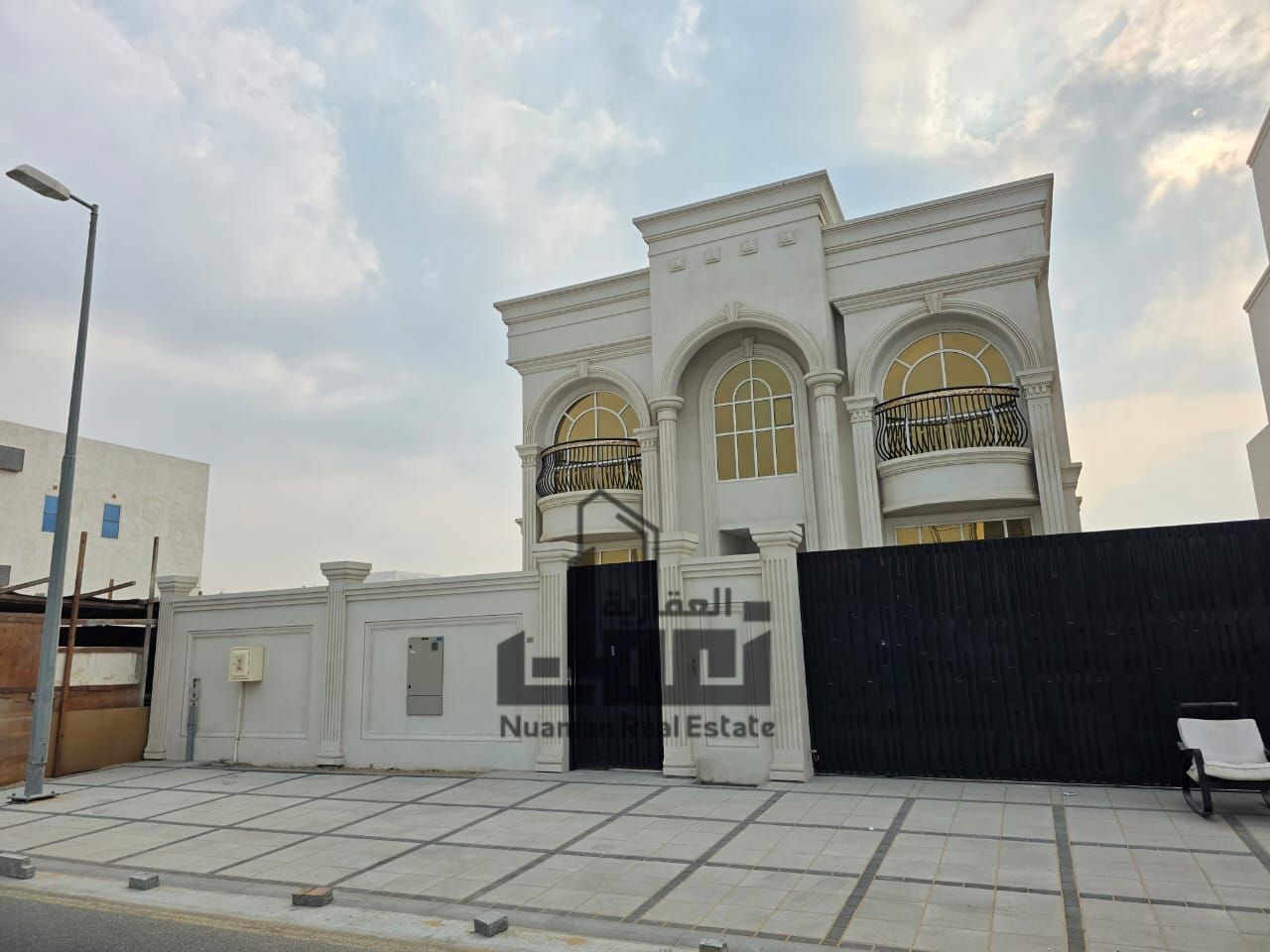 A luxurious classic villa in Al Hooshi with an elegant design and high-end finishes, spacious areas and a tranquil view